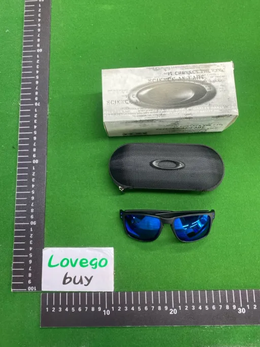Black frame, blue label, blue lens