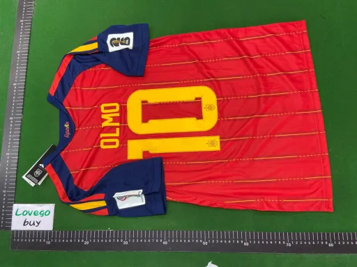 Spain home jersey, number 10 with captain's armband