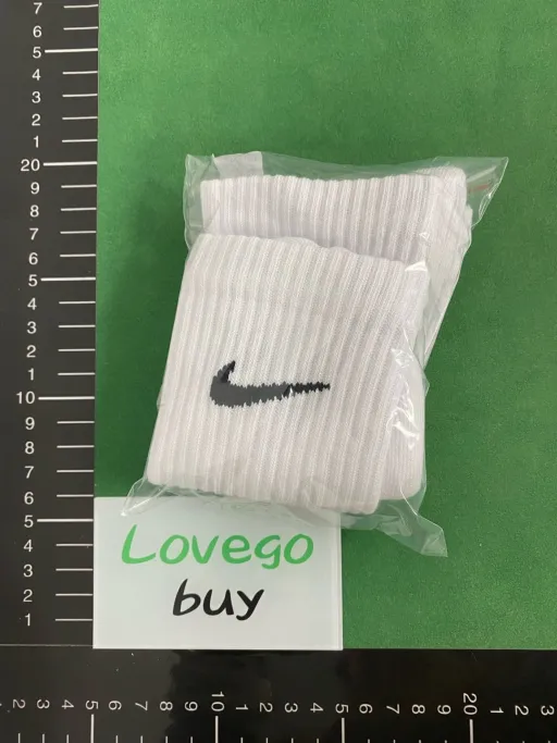 White l on the bottom of the towel [long tube card 42-46]