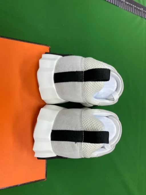1 white mesh bag and black webbing