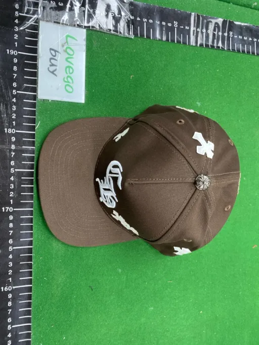 Ch cross leather patch, brown and white