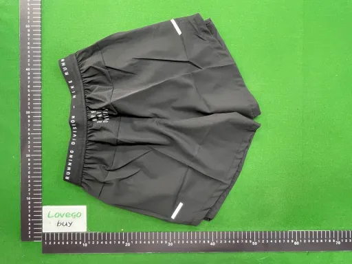Patterned short-sleeved green = patterned shorts black