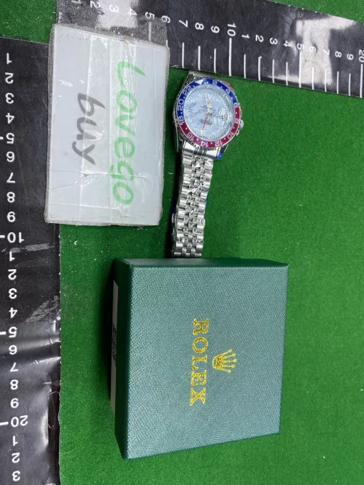 Five-bead red, blue and white-faced cola ring